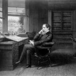 This vintage image features Charles Dickens in his study.
