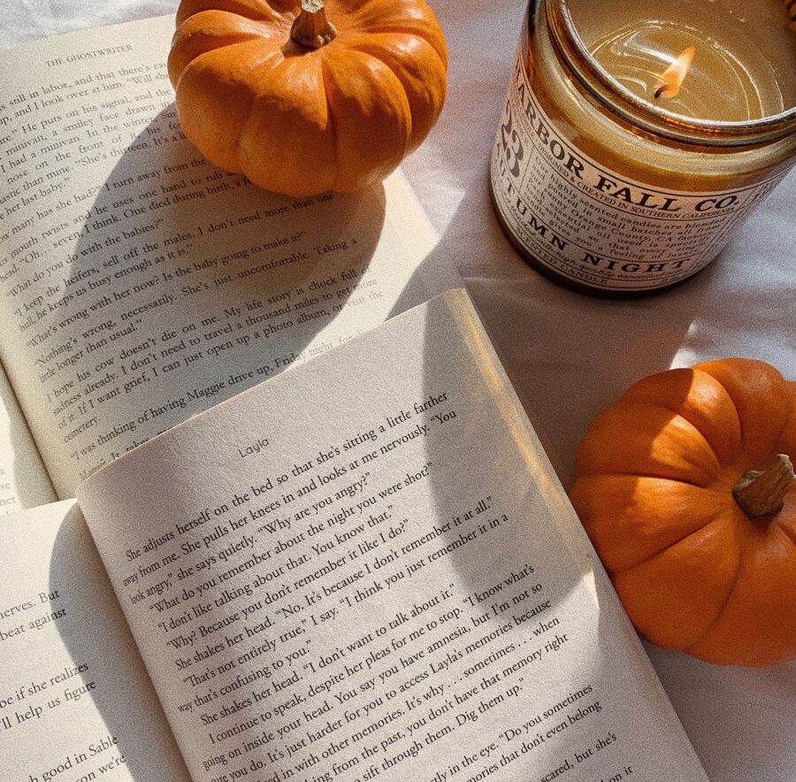 fall book aesthetic with pumpkins